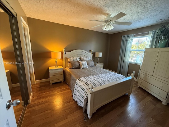 609 Waterside Dr Unit 609, Hypoluxo, FL 33462 - bedroom featuring a textured ceiling, wood finished floors, and ceiling fan