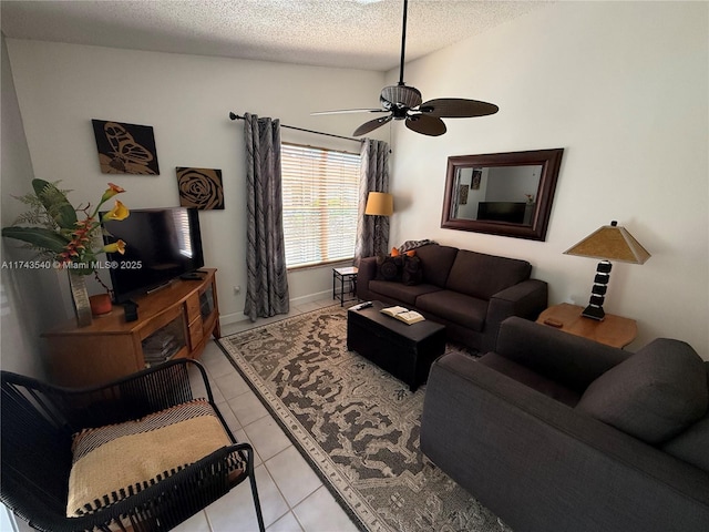 609 Waterside Dr Unit 609, Hypoluxo, FL 33462 - living room with a ceiling fan, a textured ceiling, and light tile patterned flooring