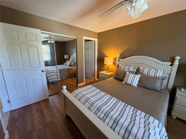 609 Waterside Dr Unit 609, Hypoluxo, FL 33462 - bedroom with wood finished floors, a textured ceiling, and ceiling fan