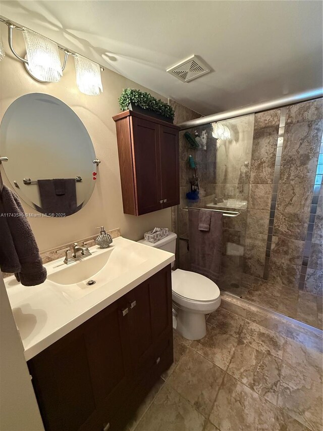 609 Waterside Dr Unit 609, Hypoluxo, FL 33462 - bathroom featuring double vanity and tiled shower