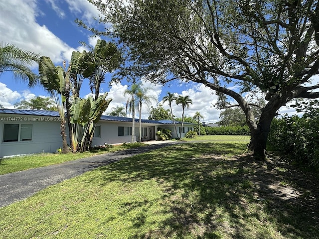 view of front of home with a front yard