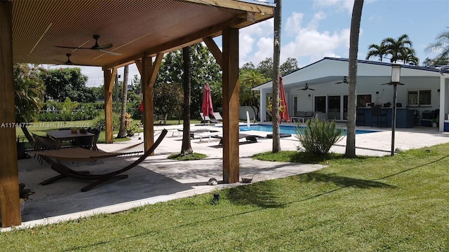 view of patio / terrace featuring ceiling fan