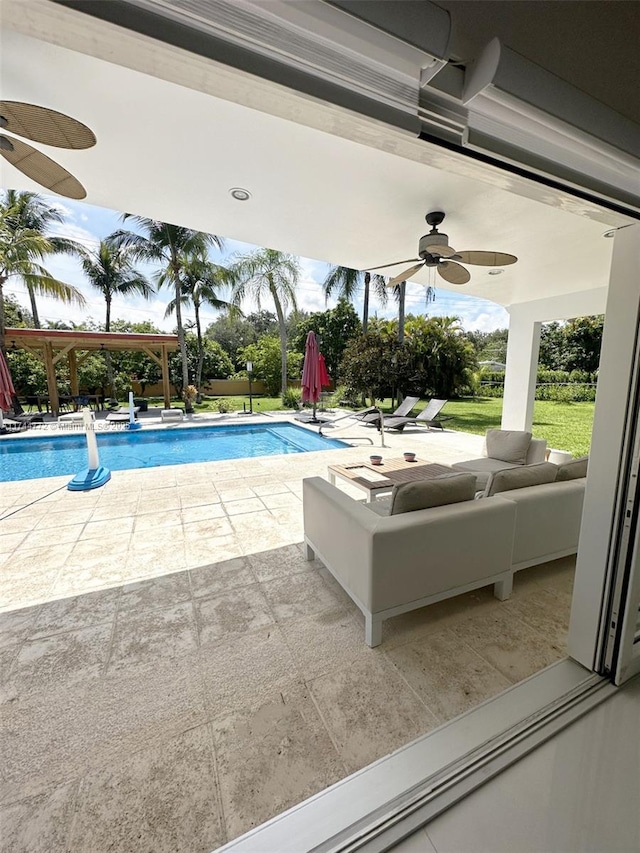 view of swimming pool with a patio area