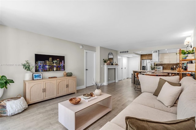 living room featuring light hardwood / wood-style floors