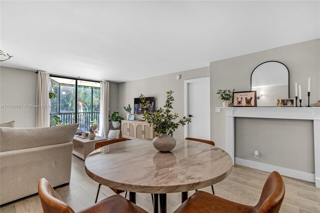 dining room with light hardwood / wood-style floors