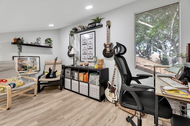 office space with light hardwood / wood-style floors