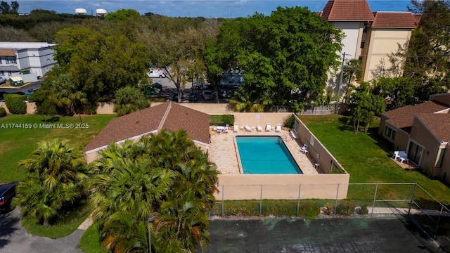 view of swimming pool featuring a patio area