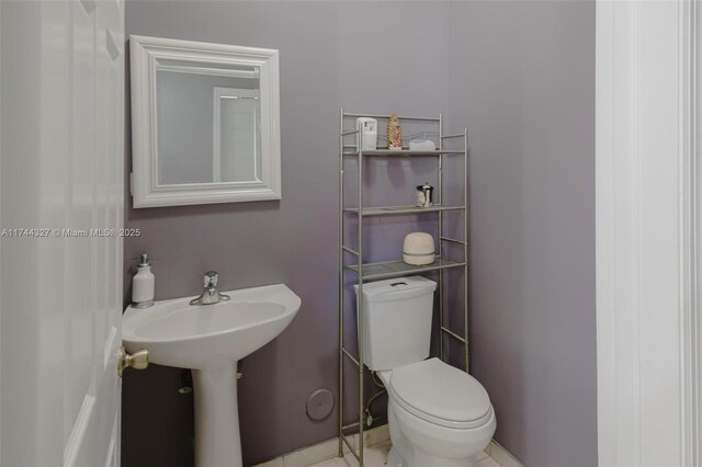 2120 SE 17th Ave, Homestead, FL 33035 - bathroom featuring toilet and a sink