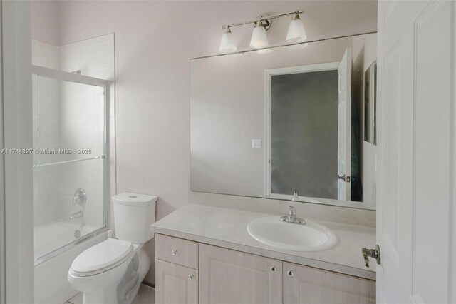 2120 SE 17th Ave, Homestead, FL 33035 - full bathroom featuring vanity and bath / shower combo with glass door
