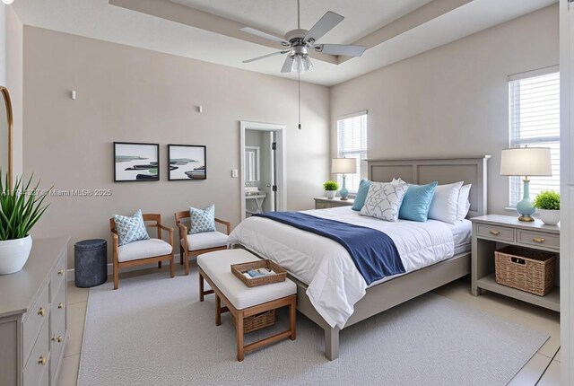 2120 SE 17th Ave, Homestead, FL 33035 - bedroom with a raised ceiling and light tile patterned flooring