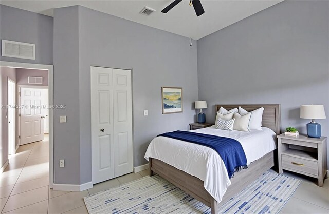 2120 SE 17th Ave, Homestead, FL 33035 - bedroom featuring light tile patterned flooring, a ceiling fan, and a high ceiling