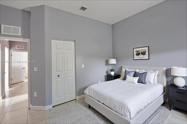 2120 SE 17th Ave, Homestead, FL 33035 - bedroom with light tile patterned flooring and a closet