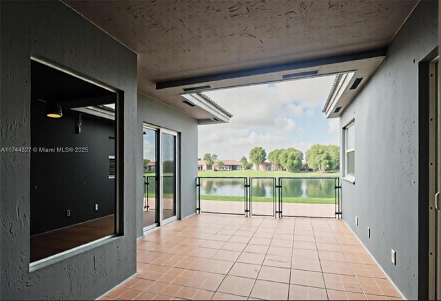 2120 SE 17th Ave, Homestead, FL 33035 - unfurnished sunroom with a water view