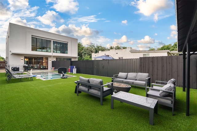 exterior space featuring a fenced in pool and an outdoor living space with a fire pit