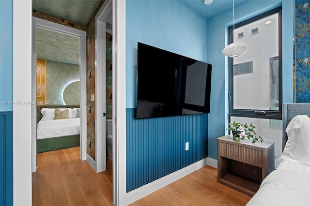 bedroom featuring wood-type flooring