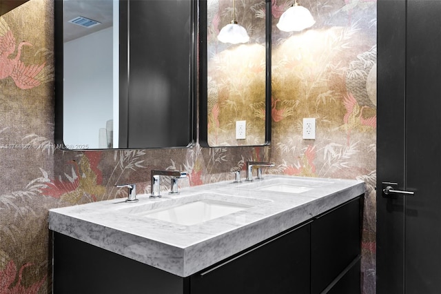 bathroom with vanity and decorative backsplash