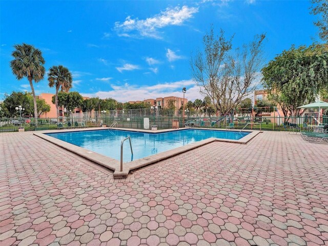 9420 W Flagler St Unit 312, Miami, FL 33174 - community pool featuring fence and a patio