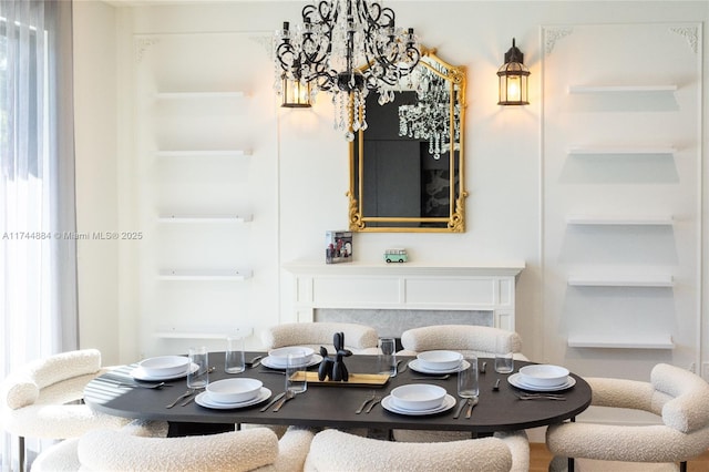 dining room with a notable chandelier