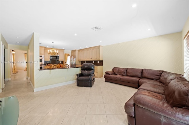 2061 NE 207th St, Miami, FL 33179 - living room featuring a chandelier, light tile patterned floors, recessed lighting, and baseboards