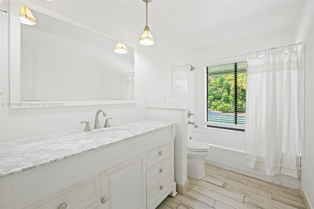 2061 NE 207th St, Miami, FL 33179 - full bathroom featuring shower / bath combo with shower curtain, vanity, toilet, and wood finished floors