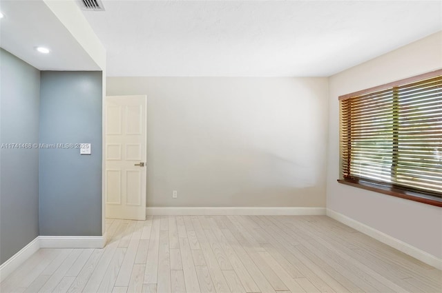 2061 NE 207th St, Miami, FL 33179 - unfurnished room with wood finished floors, baseboards, and recessed lighting
