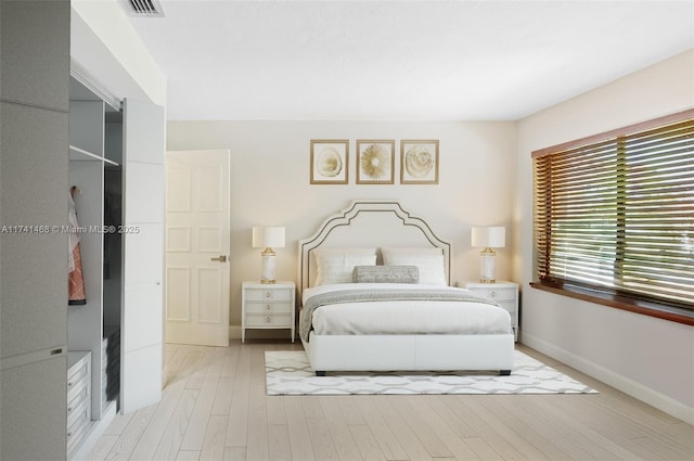 2061 NE 207th St, Miami, FL 33179 - bedroom featuring baseboards and wood finished floors