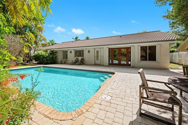 2061 NE 207th St, Miami, FL 33179 - view of pool featuring french doors and a patio area
