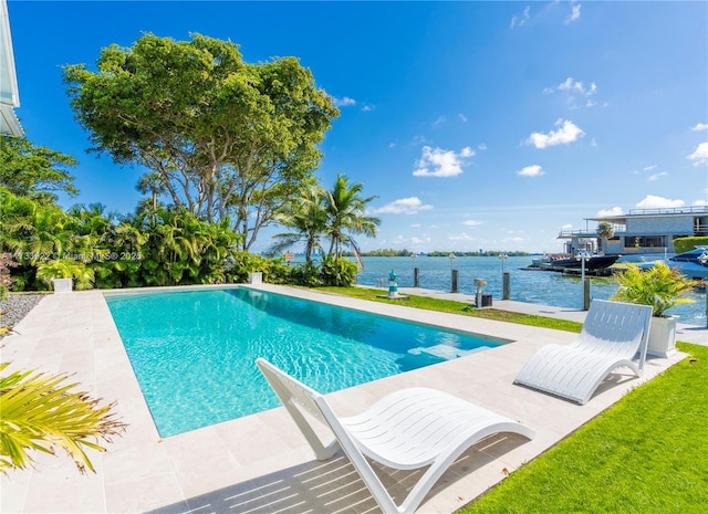 view of pool with a dock and a water view