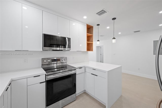 kitchen with stainless steel appliances, a peninsula, modern cabinets, and visible vents