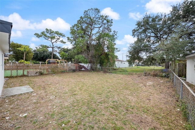 view of yard featuring a fenced backyard