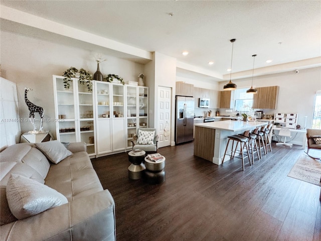 living room featuring dark wood-type flooring