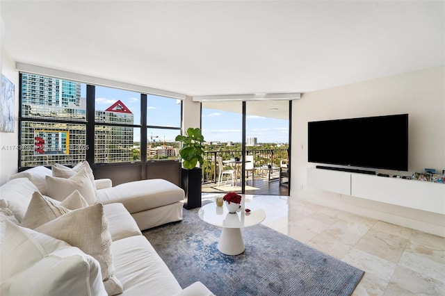 living room with floor to ceiling windows