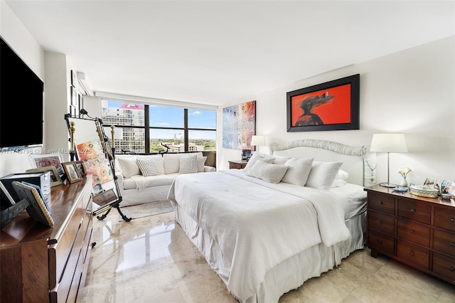 bedroom with floor to ceiling windows