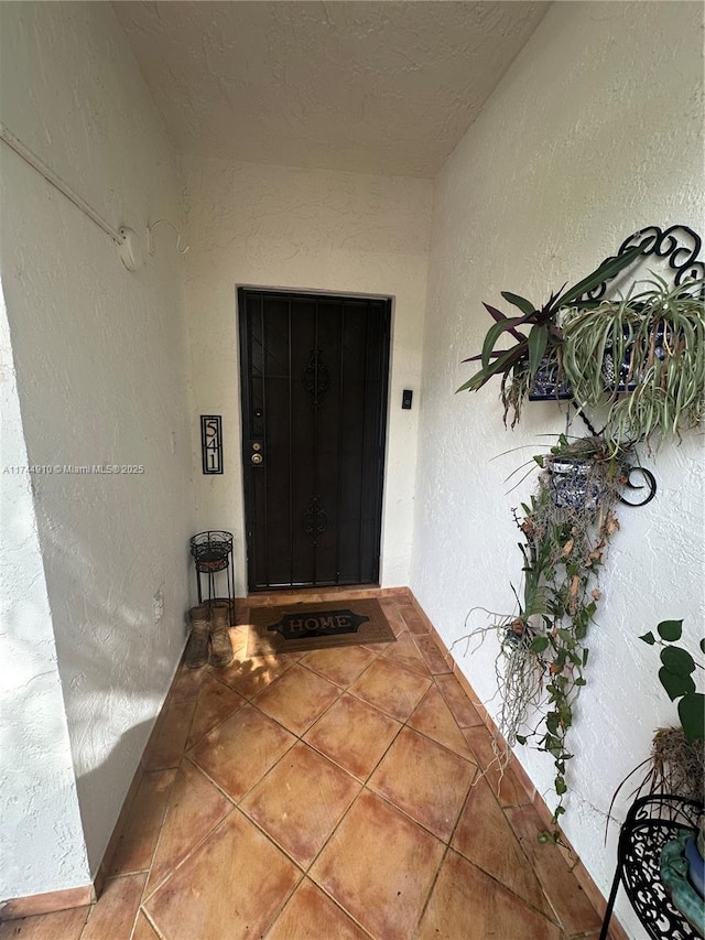 541 NE 199th Ln Unit 2X, Miami, FL 33179 - property entrance featuring stucco siding
