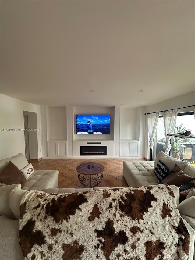 541 NE 199th Ln Unit 2X, Miami, FL 33179 - living area with a fireplace and tile patterned floors