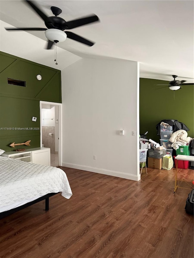 541 NE 199th Ln Unit 2X, Miami, FL 33179 - bedroom featuring baseboards, vaulted ceiling, and wood finished floors