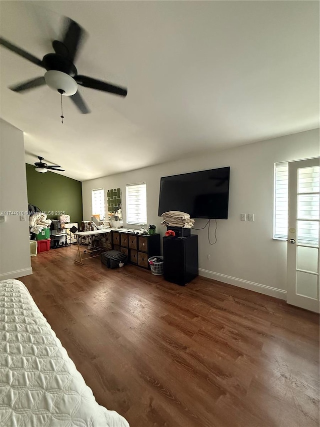 541 NE 199th Ln Unit 2X, Miami, FL 33179 - living room featuring plenty of natural light, a ceiling fan, baseboards, and wood finished floors
