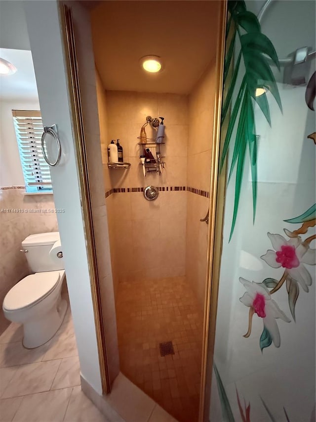 541 NE 199th Ln Unit 2X, Miami, FL 33179 - full bathroom with toilet, tile walls, tile patterned flooring, and a stall shower