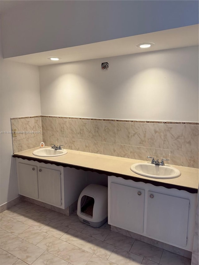 541 NE 199th Ln Unit 2X, Miami, FL 33179 - bathroom featuring recessed lighting, tile walls, a wainscoted wall, and vanity