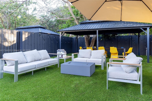 view of patio featuring an outdoor living space and a gazebo