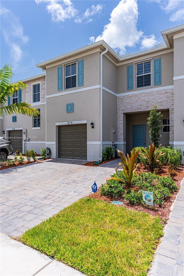 view of front of property with a garage