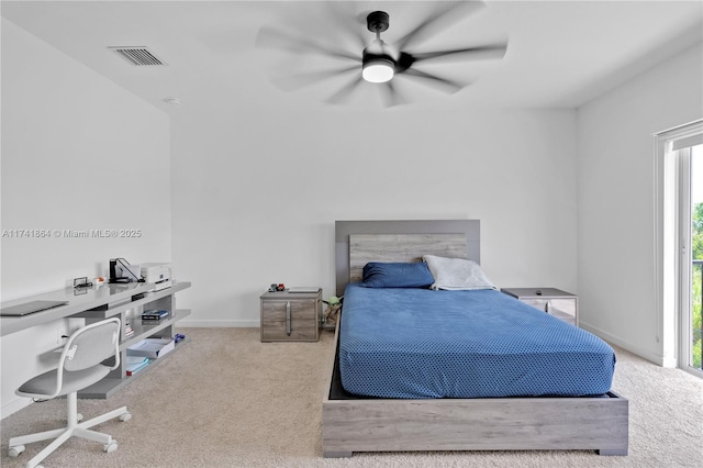 bedroom with ceiling fan and carpet