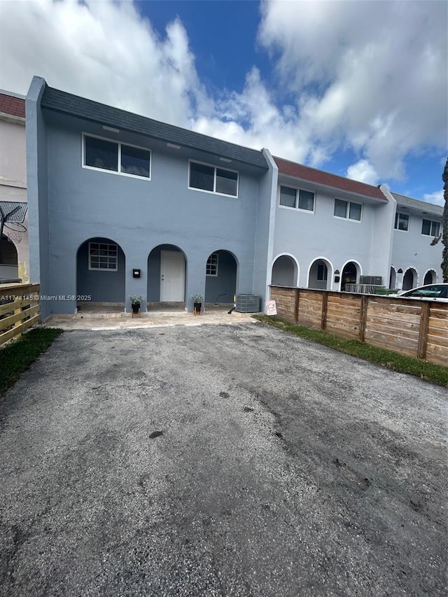 view of front of home featuring cooling unit