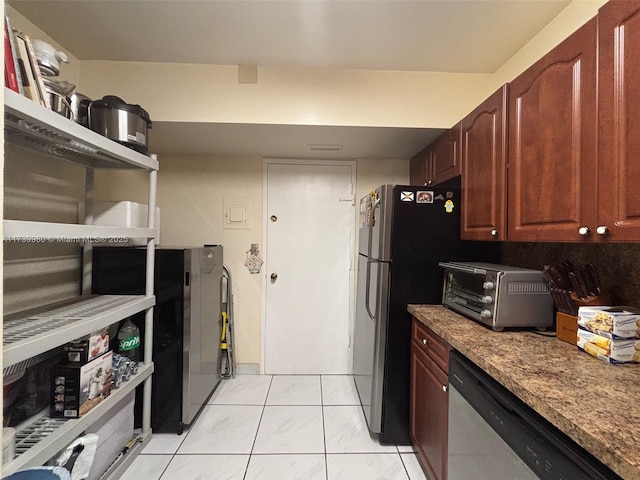 kitchen with light stone counters, marble finish floor, a toaster, and stainless steel dishwasher