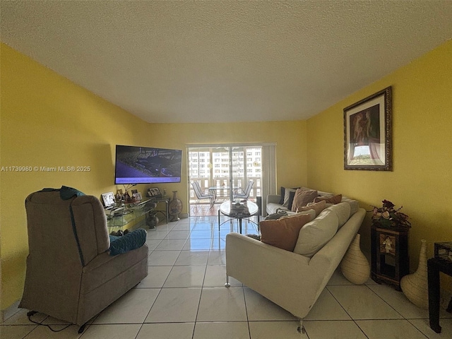 tiled living room with a textured ceiling