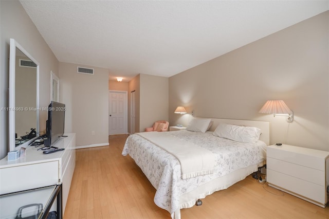 1950 S Ocean Dr Unit 2E, Hallandale Beach, FL 33009 - bedroom with light wood-style flooring, a closet, visible vents, and baseboards