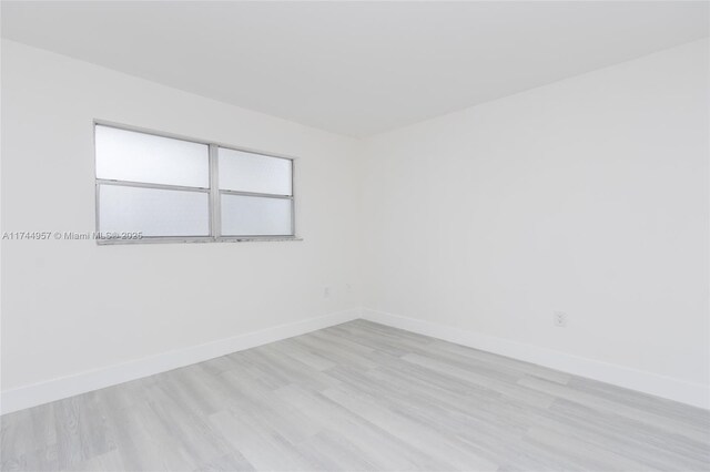 empty room featuring light hardwood / wood-style floors