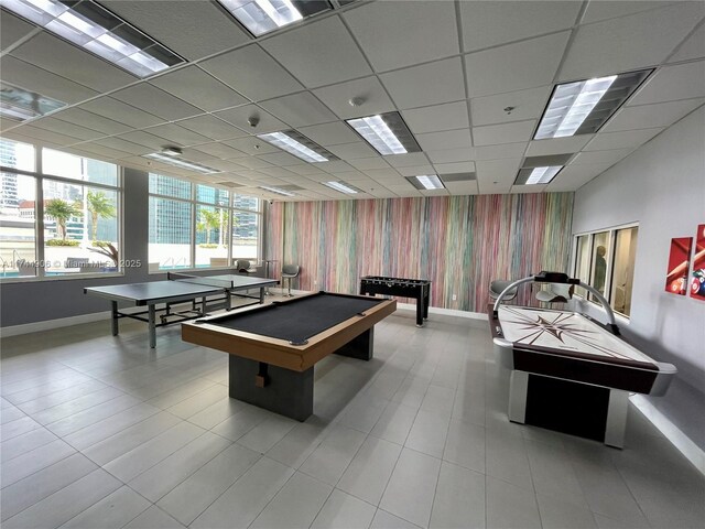 game room featuring pool table and a paneled ceiling