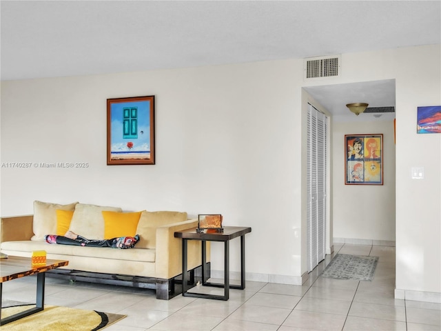 living room featuring light tile patterned floors