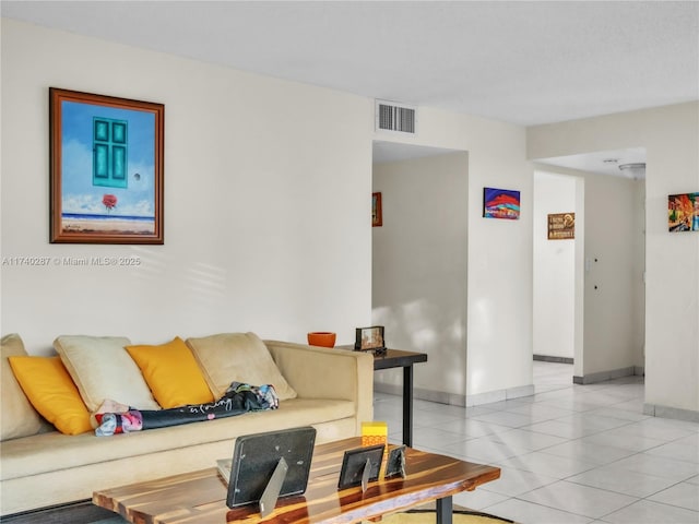 living room with light tile patterned flooring